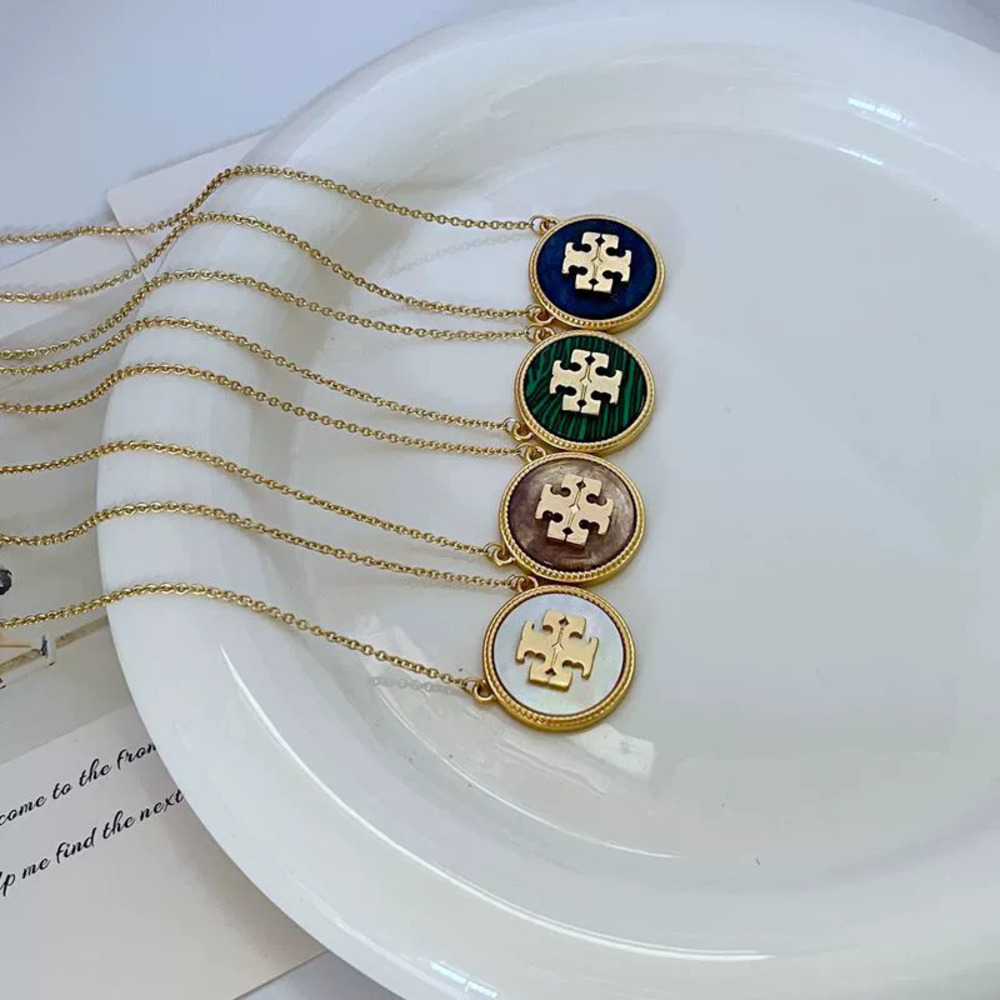 Tory Burch Natural Shell Round Pendant Metal Necklace